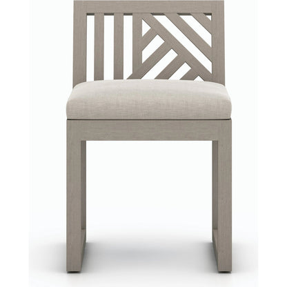 Avalon Outdoor Armless Dining Chair by Four Hands in charcoal / grey. Made from 100% olefin, solid fsc®-certified teak, 91% polyurethane foam pad, 9% polyester fiber batting in a modern style.