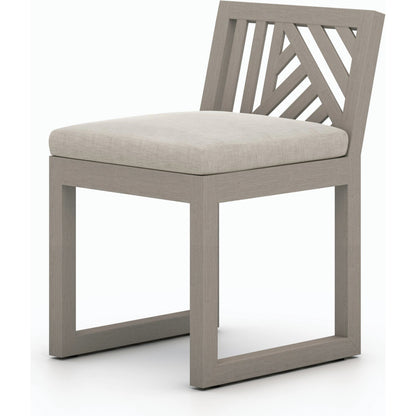 Avalon Outdoor Armless Dining Chair by Four Hands in charcoal / grey. Made from 100% olefin, solid fsc®-certified teak, 91% polyurethane foam pad, 9% polyester fiber batting in a modern style.