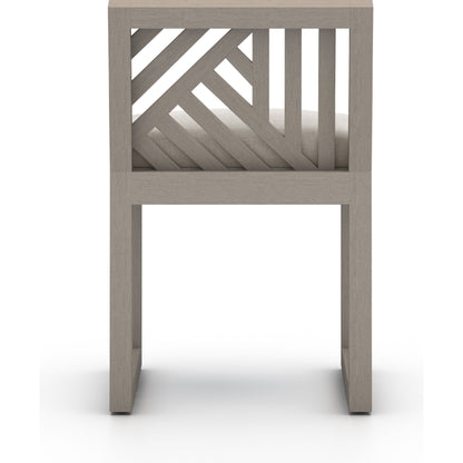 Avalon Outdoor Armless Dining Chair by Four Hands in charcoal / grey. Made from 100% olefin, solid fsc®-certified teak, 91% polyurethane foam pad, 9% polyester fiber batting in a modern style.