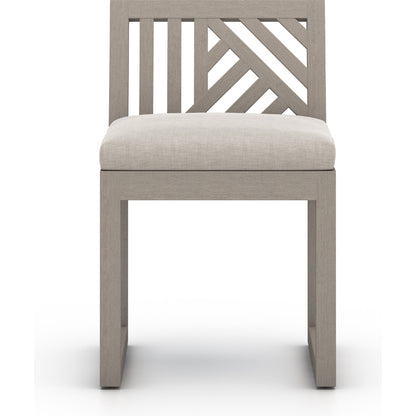 Avalon Outdoor Armless Dining Chair by Four Hands in charcoal / grey. Made from 100% olefin, solid fsc®-certified teak, 91% polyurethane foam pad, 9% polyester fiber batting in a modern style.
