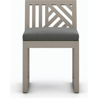 Avalon Outdoor Armless Dining Chair by Four Hands in charcoal / grey. Made from 100% olefin, solid fsc®-certified teak, 91% polyurethane foam pad, 9% polyester fiber batting in a modern style.