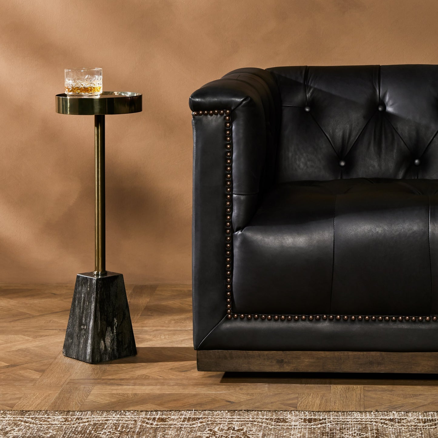 011 SI-1902901 | Lifestyle | Galen End Table by Four Hands in dark petrified wood, shiny brass. Made from petrified wood, stainless steel in a modern style.