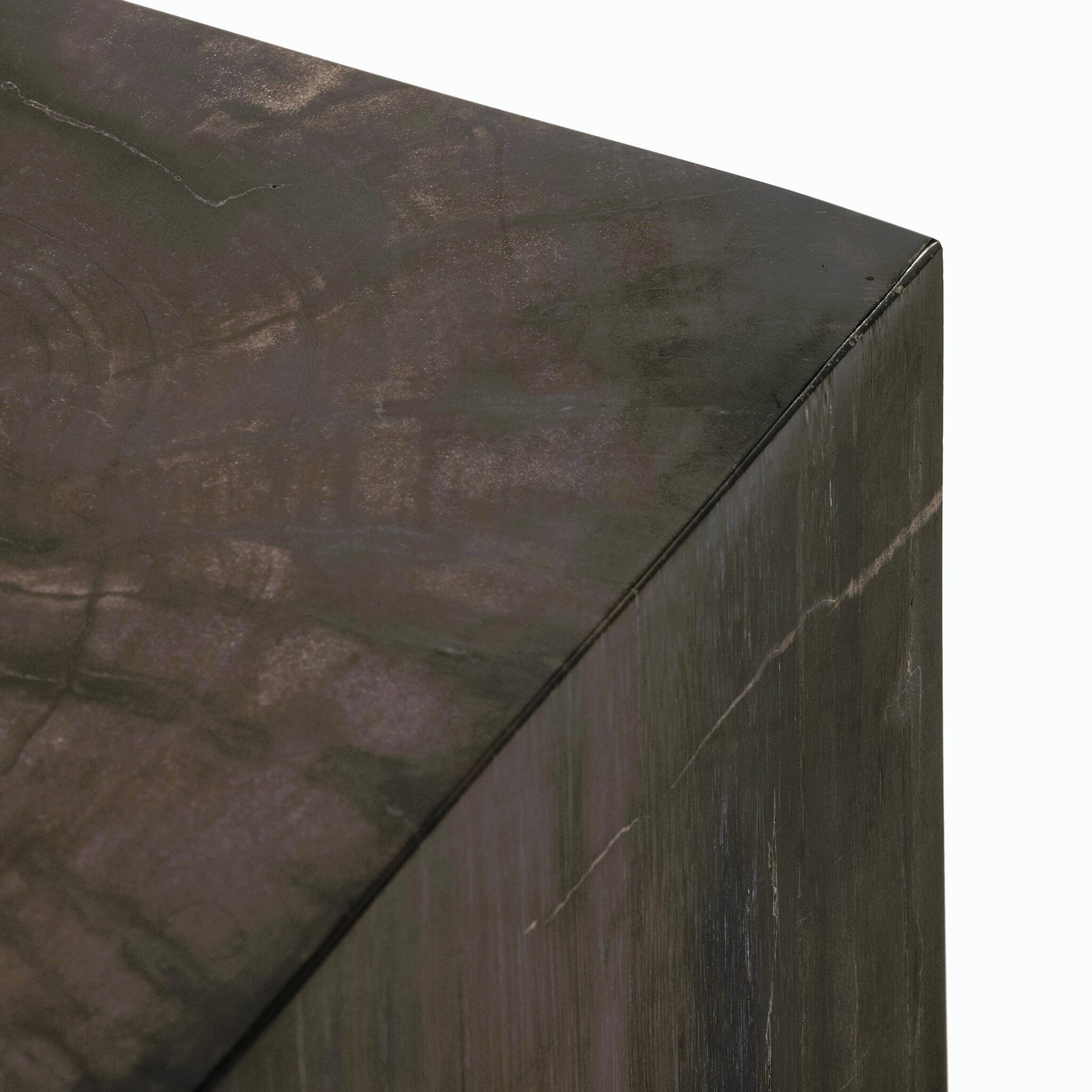 Buck End Table by Four Hands in dark petrified wood. Made from petrified wood in a rustic style.