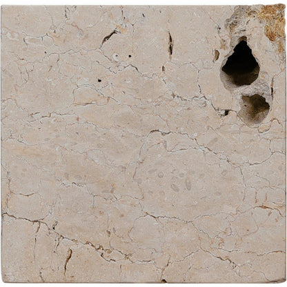 Faydon End Table by Four Hands in romano fosse travertine. Made from solid travertine in a cottage & farmhouse style.