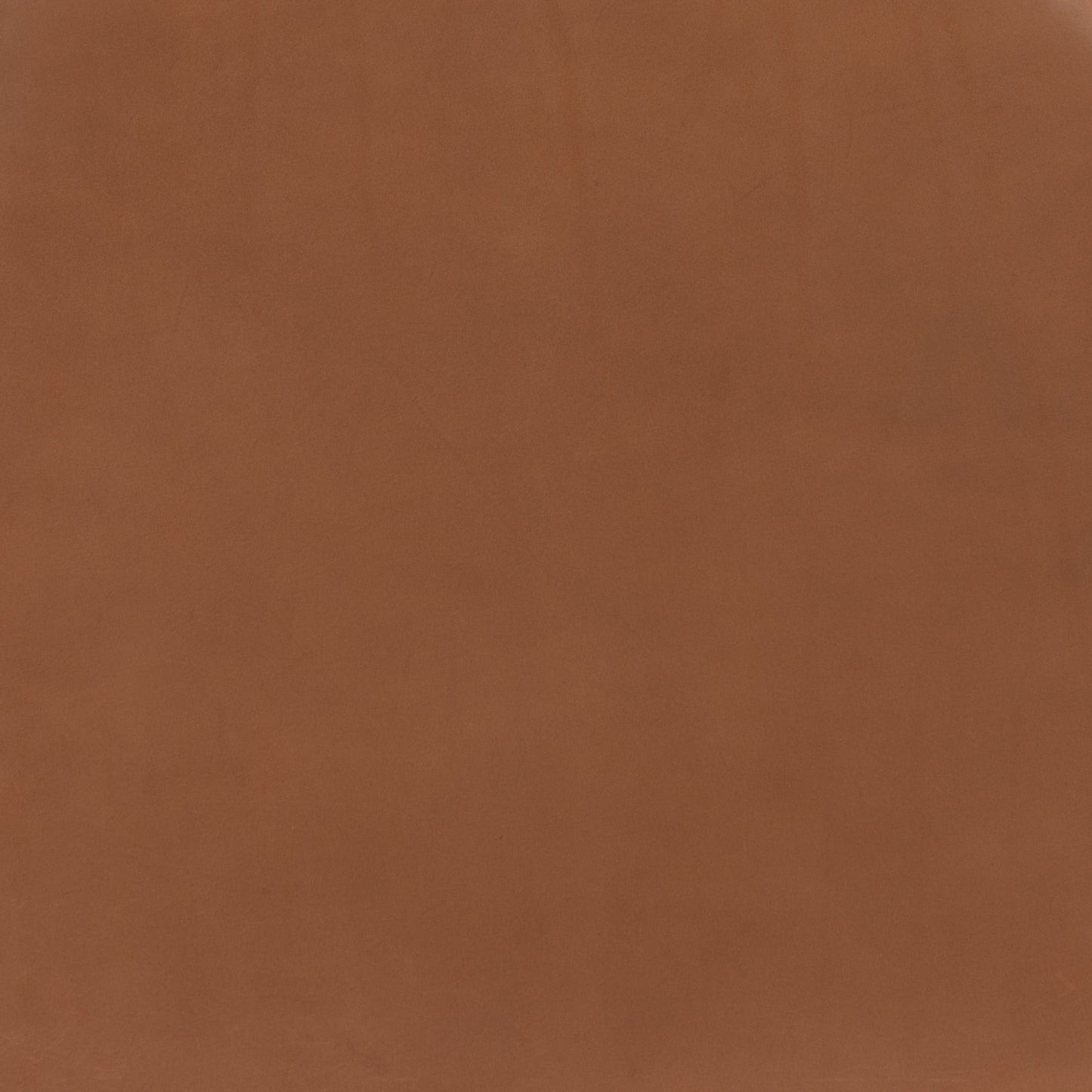 002 SI-1800024 | Closeup | Lewis & Ripley Seat Cushion by Four Hands in whiskey saddle. Made from top grain leather, 100% cotton, 90% polyurethane foam pad, 10% polyester fiber batting in a rustic style.