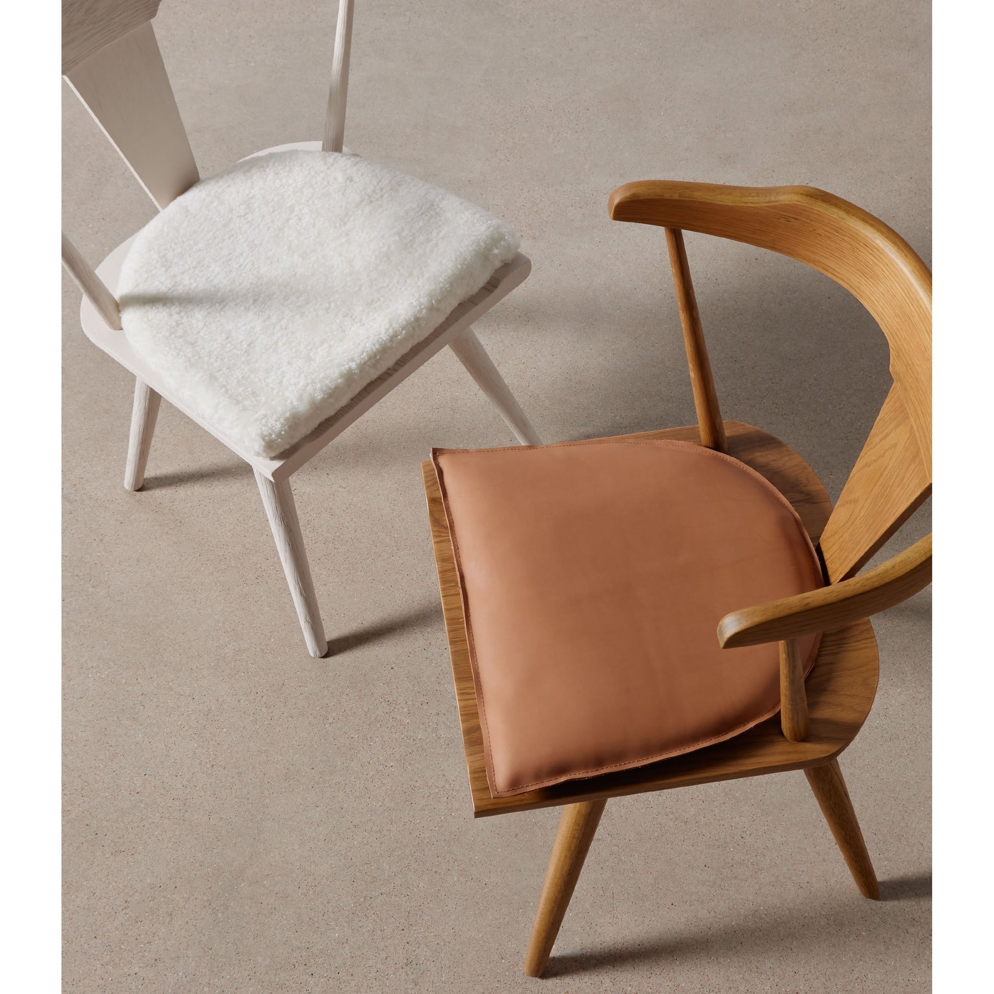 Lewis & Ripley Seat Cushion by Four Hands in whiskey saddle. Made from top grain leather, 100% cotton, 90% polyurethane foam pad, 10% polyester fiber batting in a rustic style.