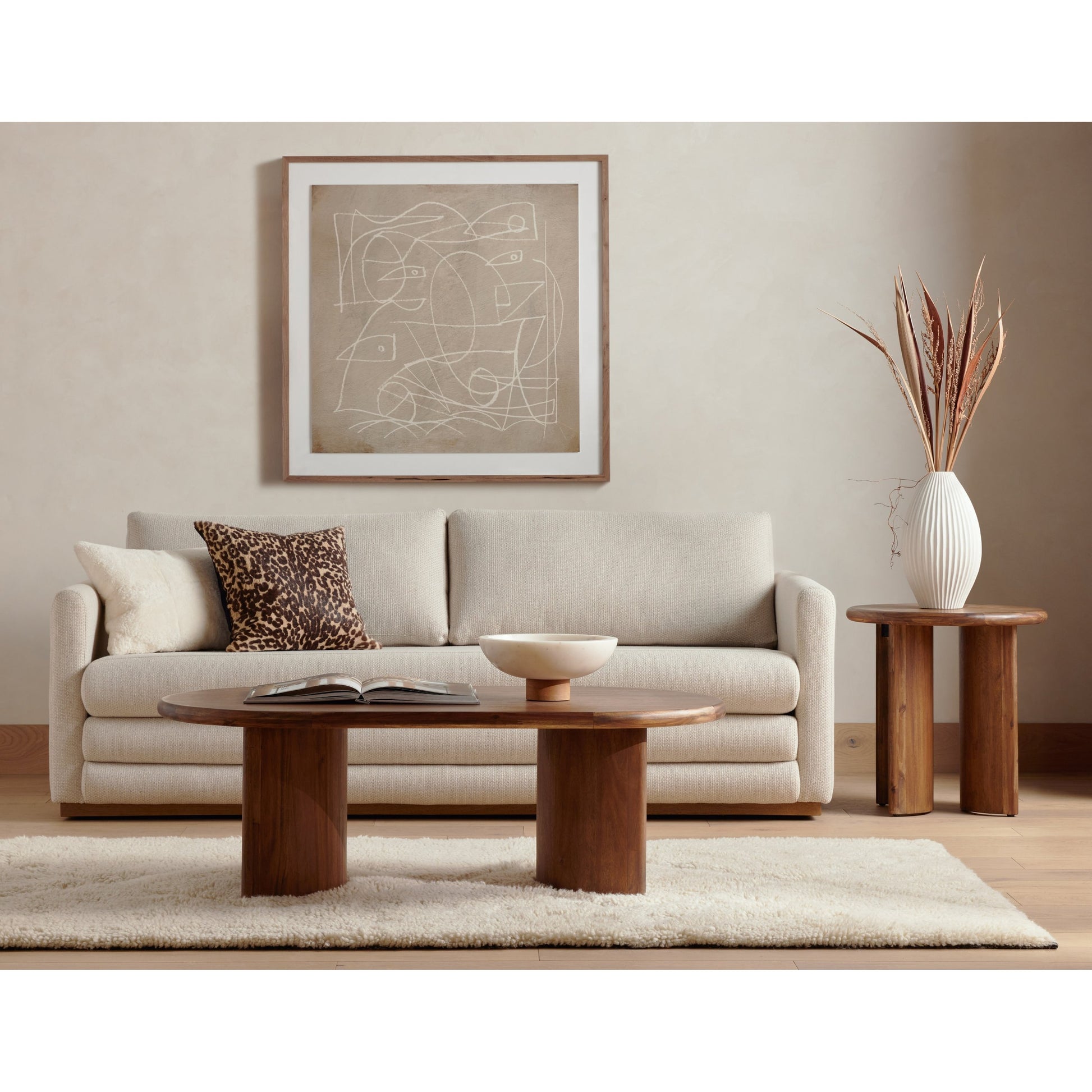 Paden End Table by Four Hands. Made from thin acacia veneer, engineered hardwood in a modern style.
