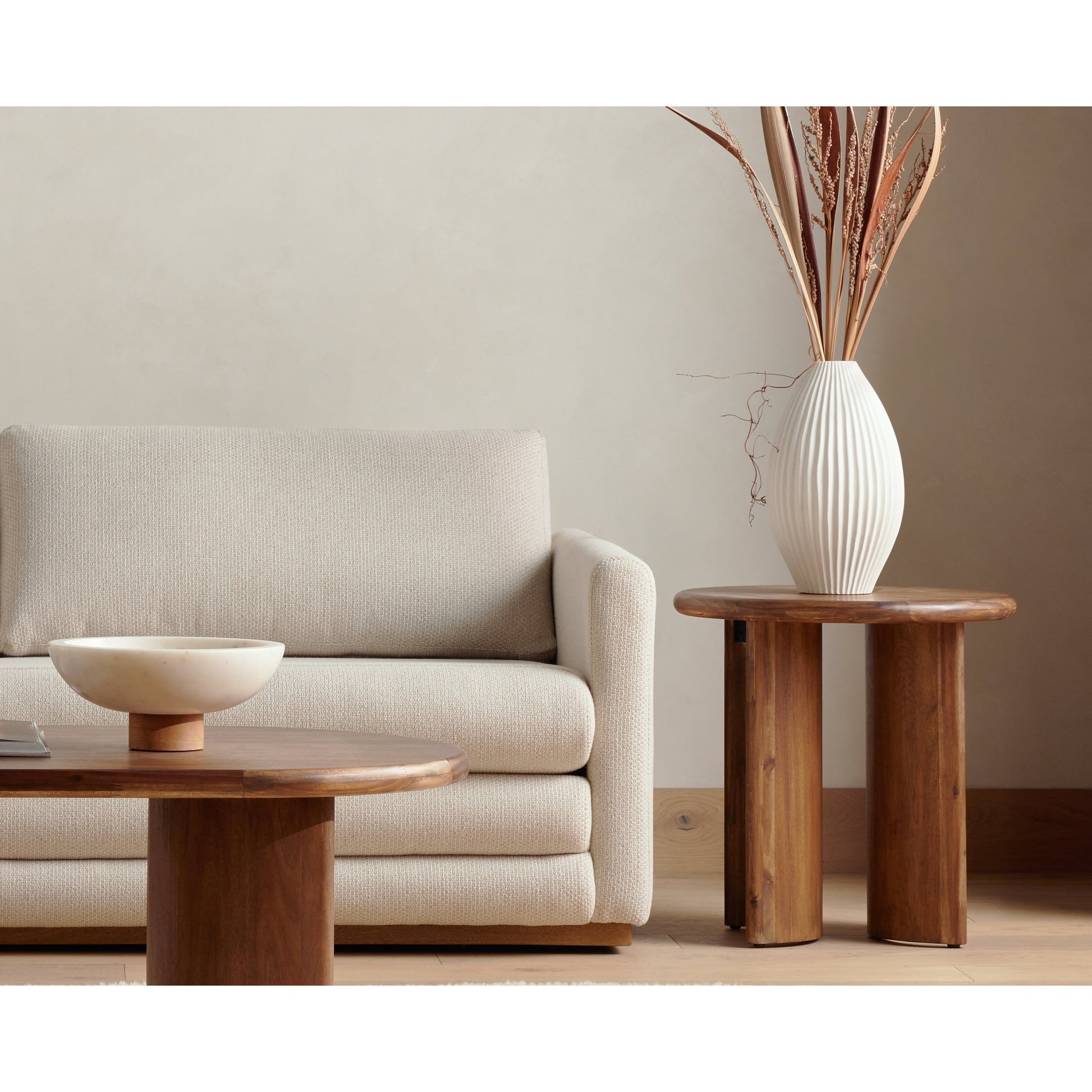 Paden End Table by Four Hands. Made from thin acacia veneer, engineered hardwood in a modern style.
