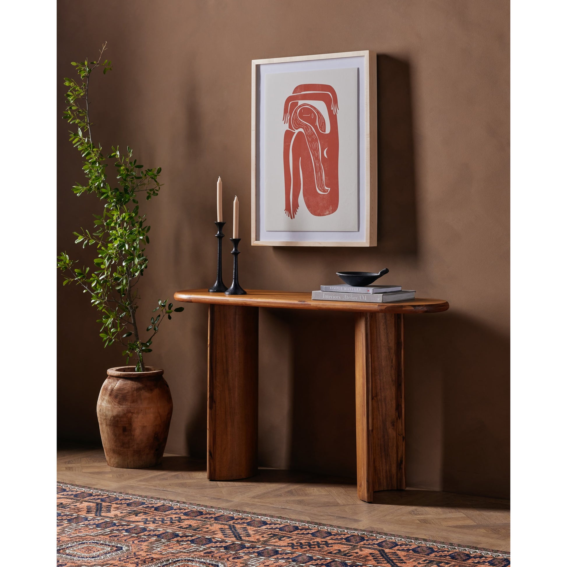 Paden Console Table by Four Hands. Made from solid acacia, engineered hardwood in a modern style.