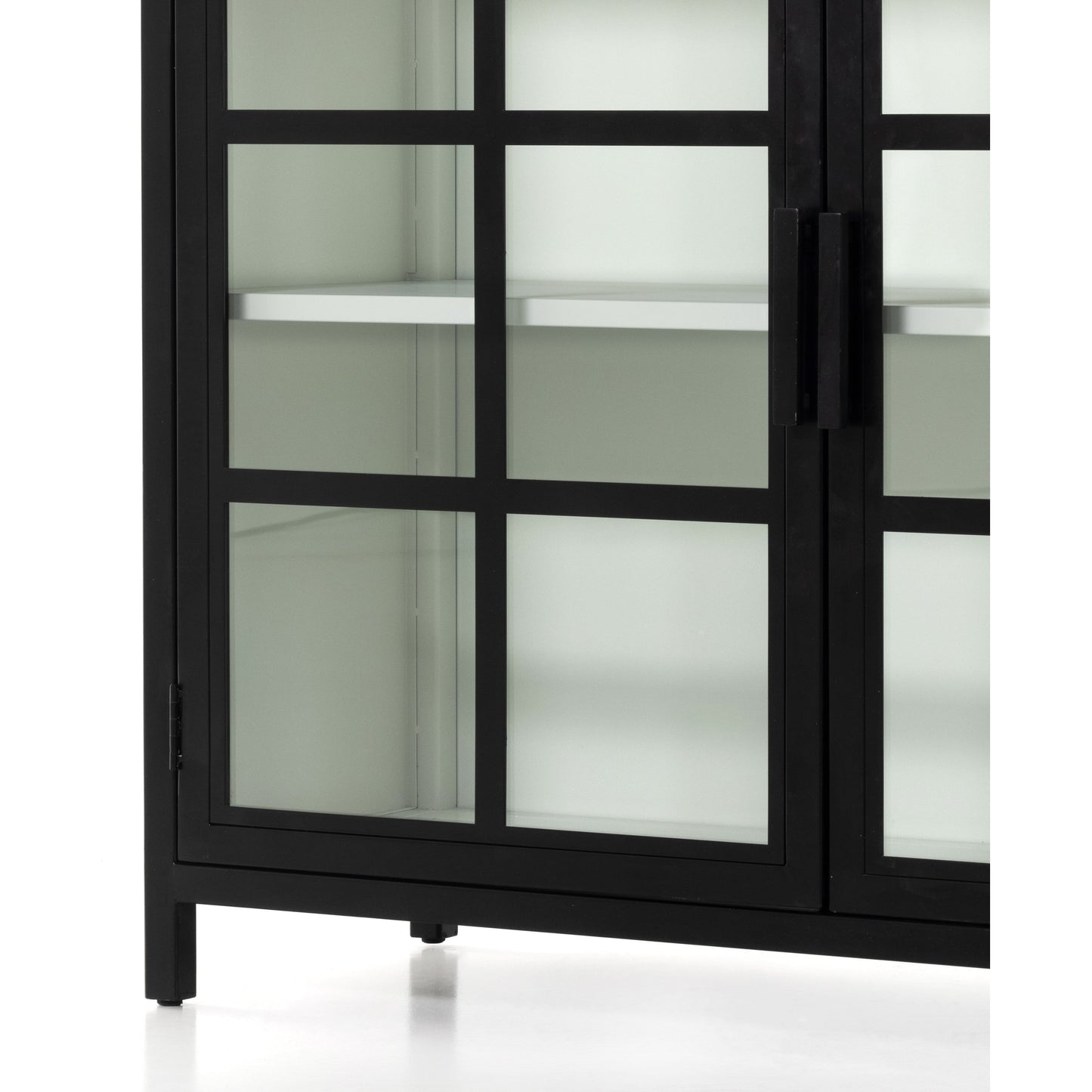 026 SI-1797976 | Closeup | Lexington Small Cabinet by Four Hands in black, tempered glass, white. Made from iron in a modern style.