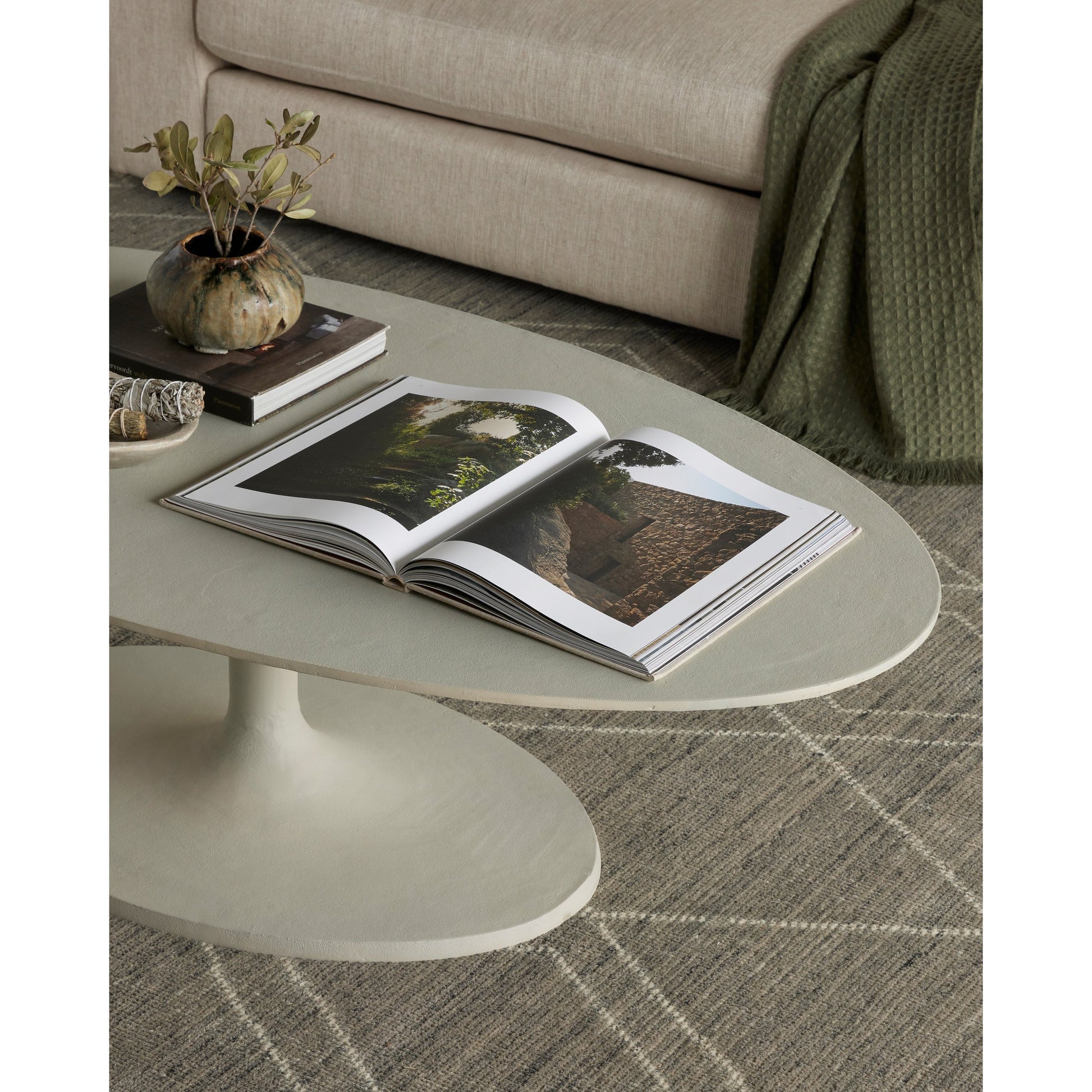 Simone Oval Coffee Table by Four Hands. Made from aluminum in a modern style.