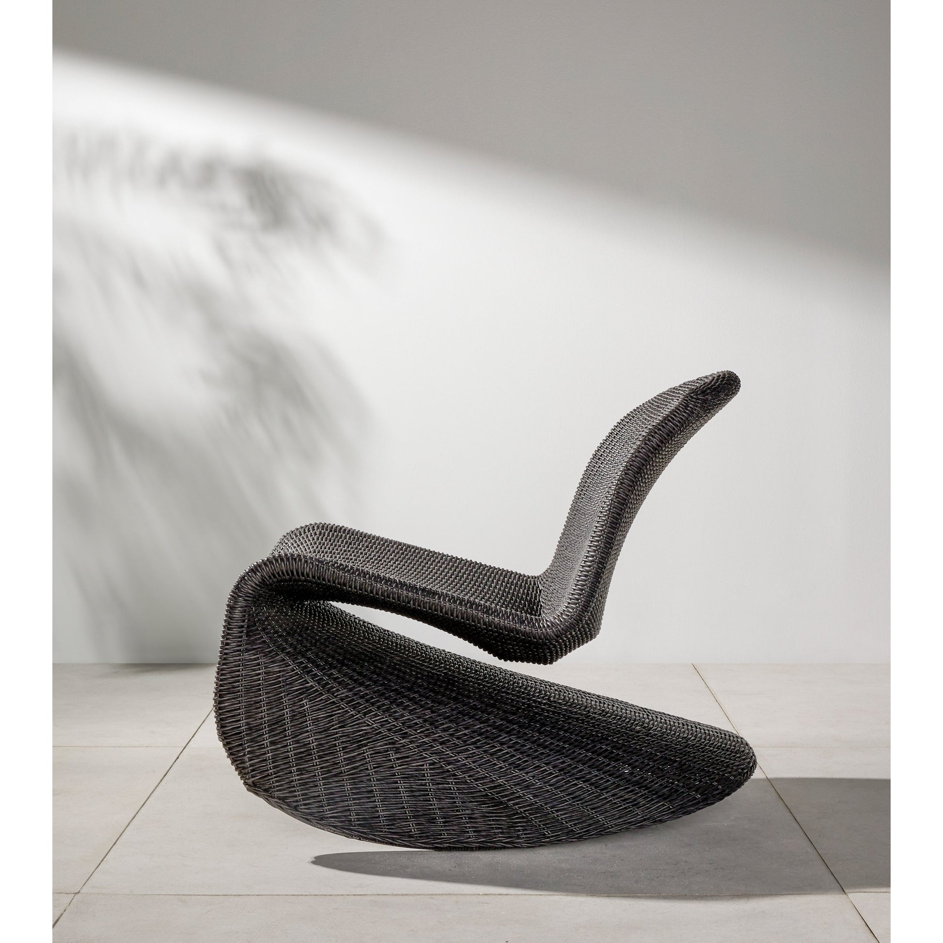 Portia Outdoor Rocking Chair by Four Hands. Made from 100% polyethylene, iron in a coastal style.