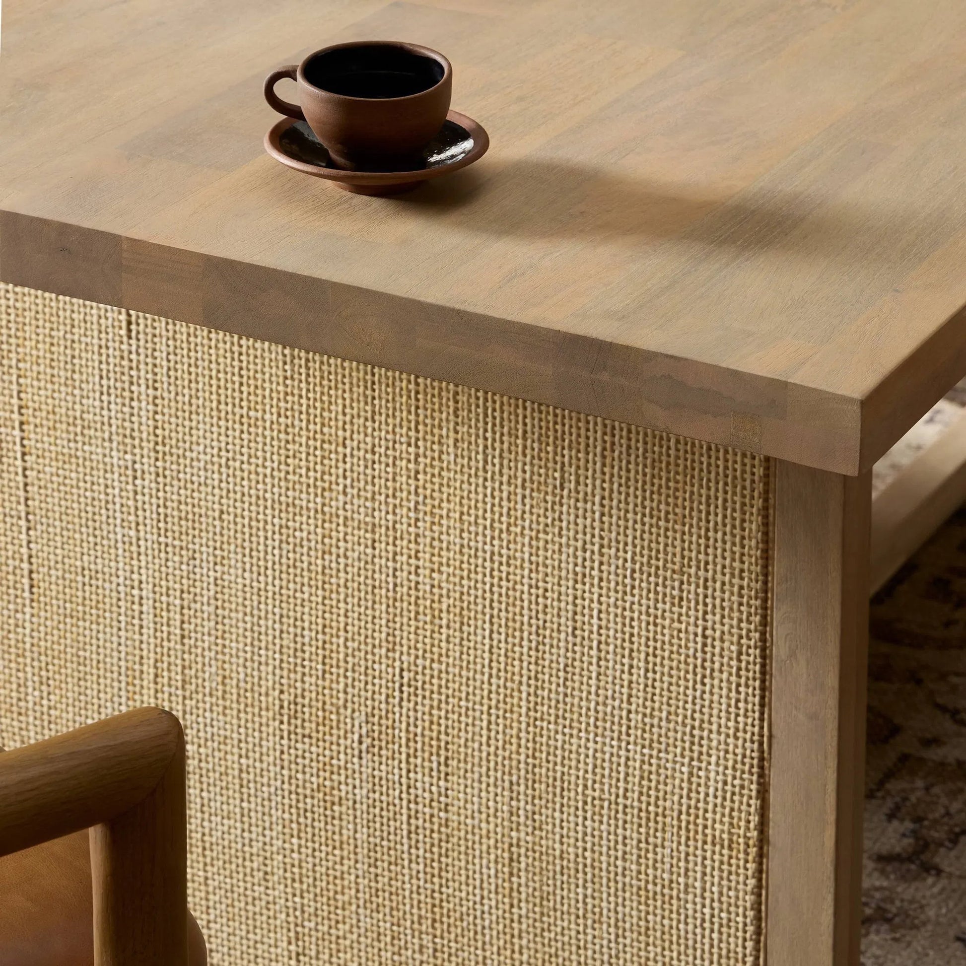 Clarita Dining Table by Four Hands in white wash mango, natural cane and white wash mango. Made from solid mango in a coastal style.