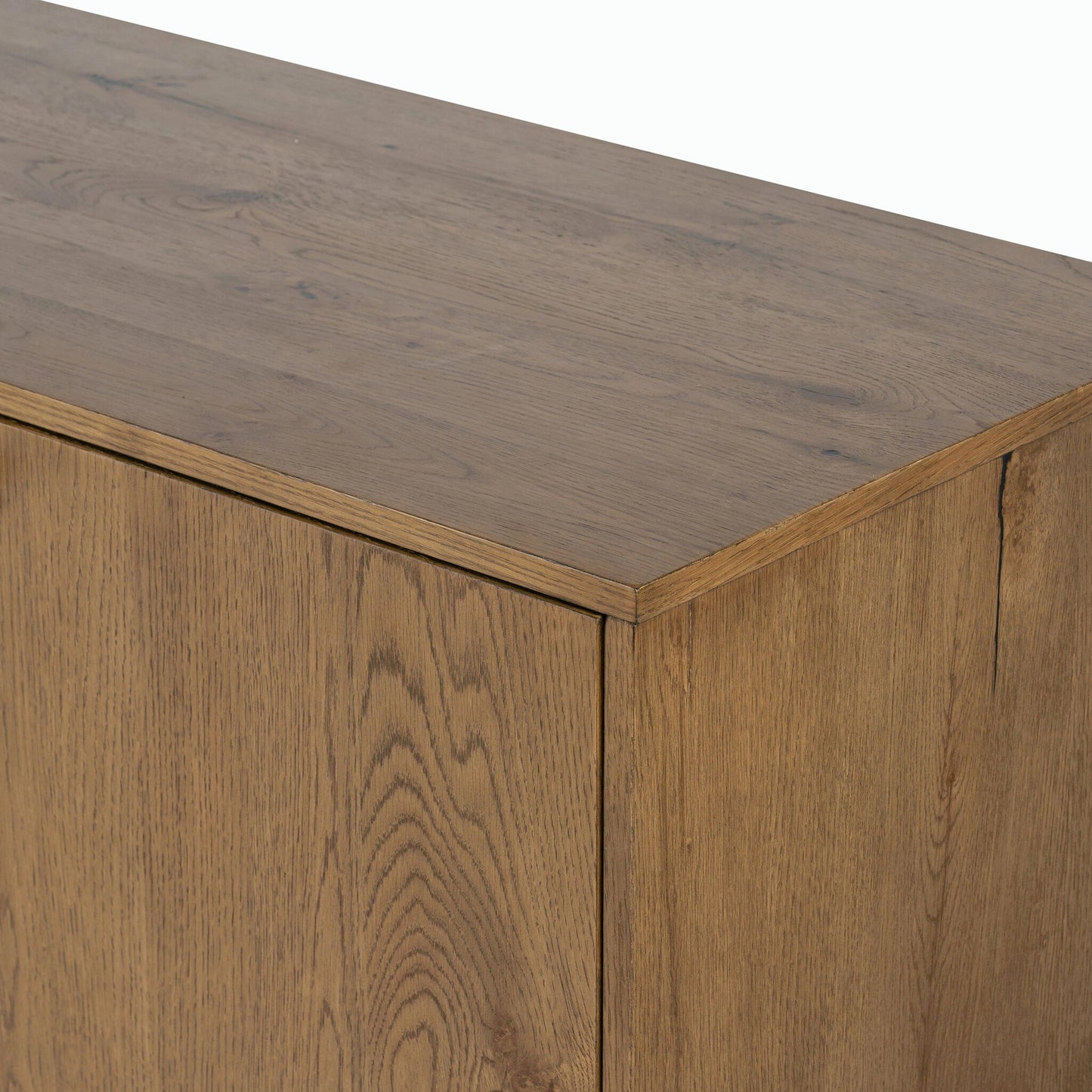 019 SI-1902696 | Closeup | Eaton Sideboard by Four Hands in amber oak resin, dark gunmetal and amber oak. Made from thick oak veneer, iron in a modern style.