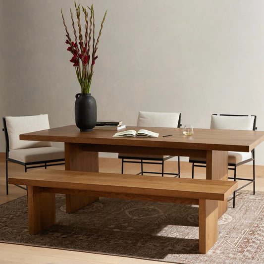 Eaton Dining Table by Four Hands in amber oak resin. Made from thick oak veneer, solid oak in a cottage & farmhouse style.