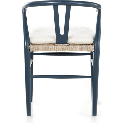 Muestra Dining Chair by Four Hands. Made from solid teak, 100% polyethylene in a coastal style.
