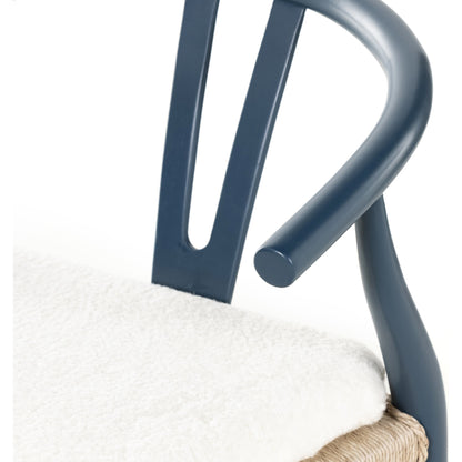Muestra Dining Chair by Four Hands. Made from solid teak, 100% polyethylene in a coastal style.
