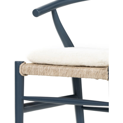 Muestra Dining Chair by Four Hands. Made from solid teak, 100% polyethylene in a coastal style.