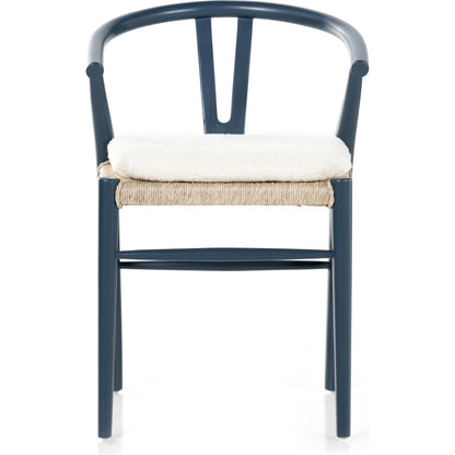 Muestra Dining Chair by Four Hands. Made from solid teak, 100% polyethylene in a coastal style.