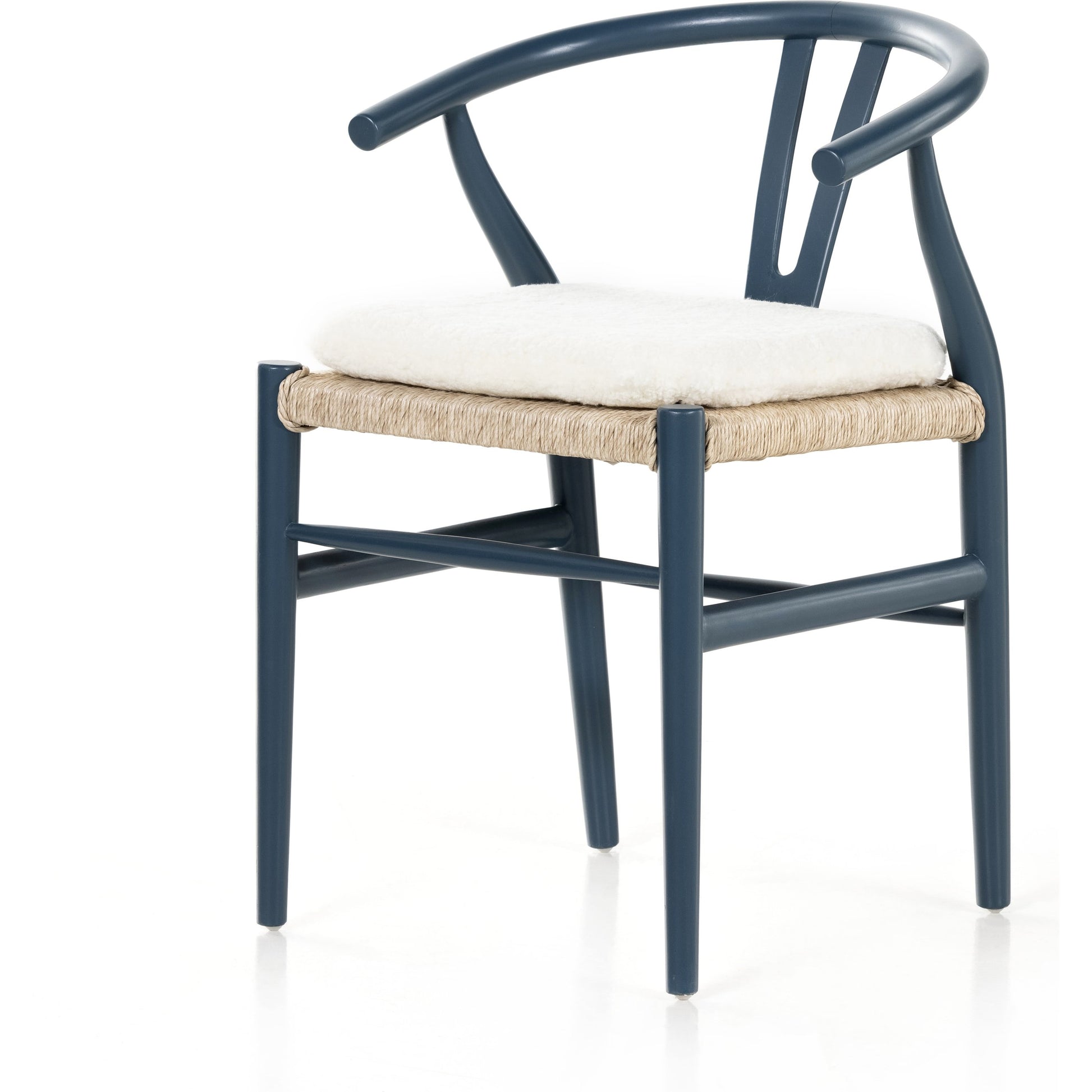Muestra Dining Chair by Four Hands. Made from solid teak, 100% polyethylene in a coastal style.