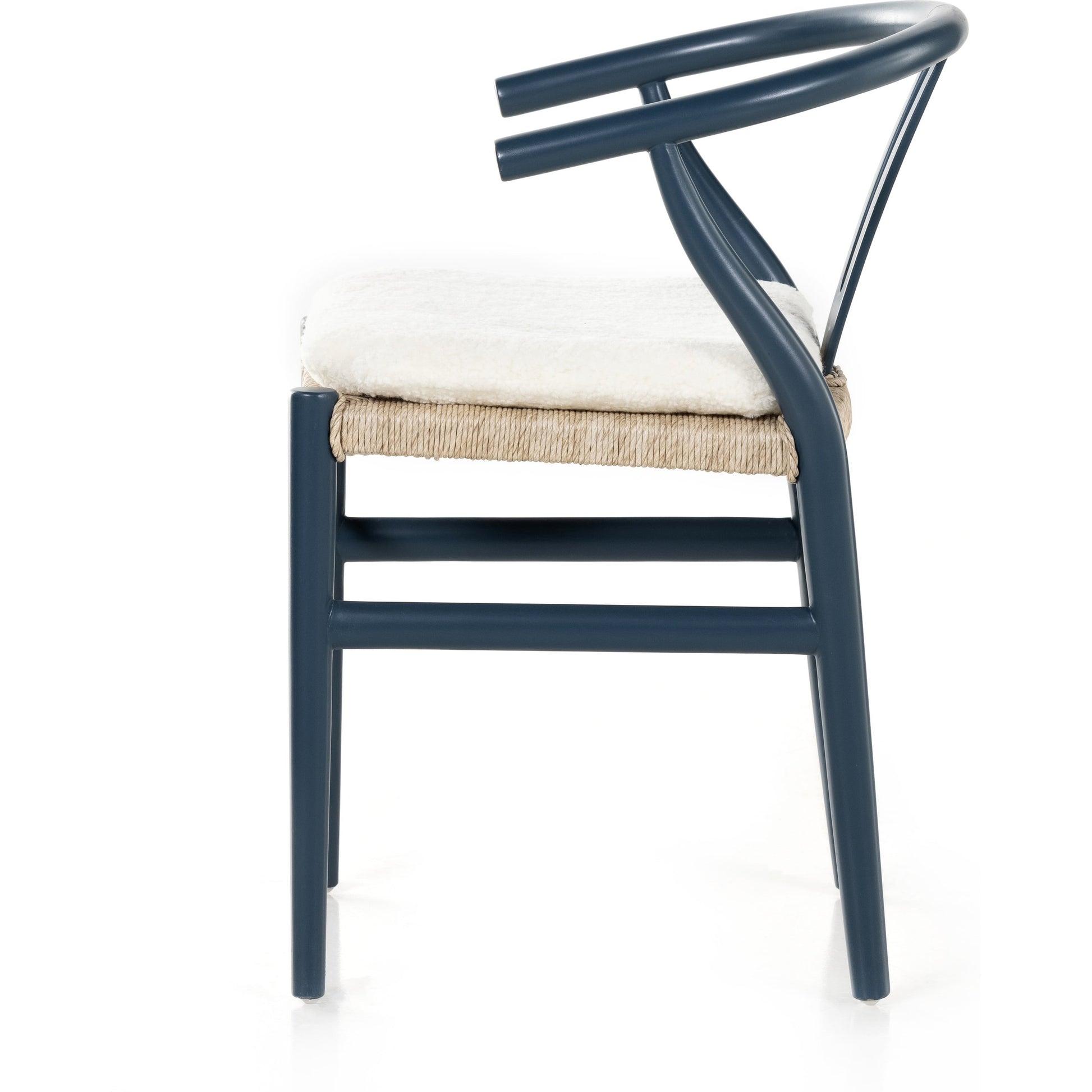 Muestra Dining Chair by Four Hands. Made from solid teak, 100% polyethylene in a coastal style.