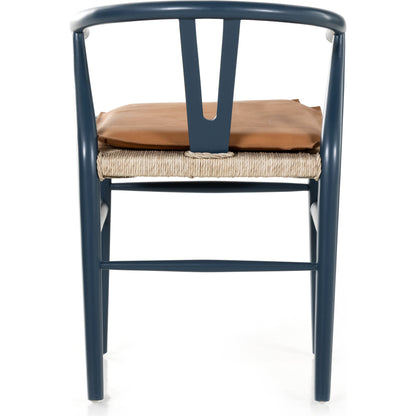 Muestra Dining Chair by Four Hands. Made from solid teak, 100% polyethylene in a coastal style.