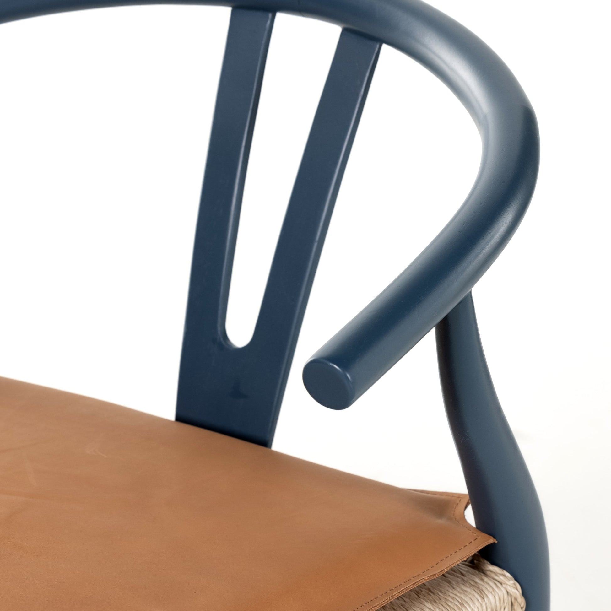 Muestra Dining Chair by Four Hands. Made from solid teak, 100% polyethylene in a coastal style.