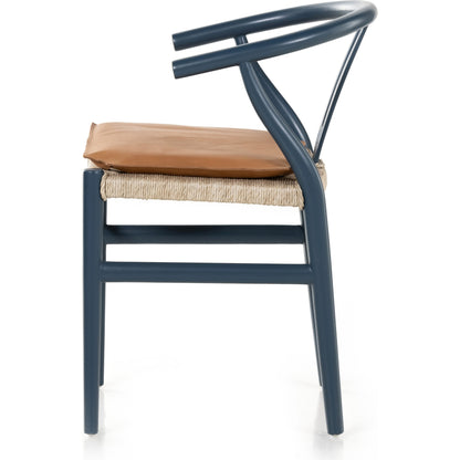 Muestra Dining Chair by Four Hands. Made from solid teak, 100% polyethylene in a coastal style.