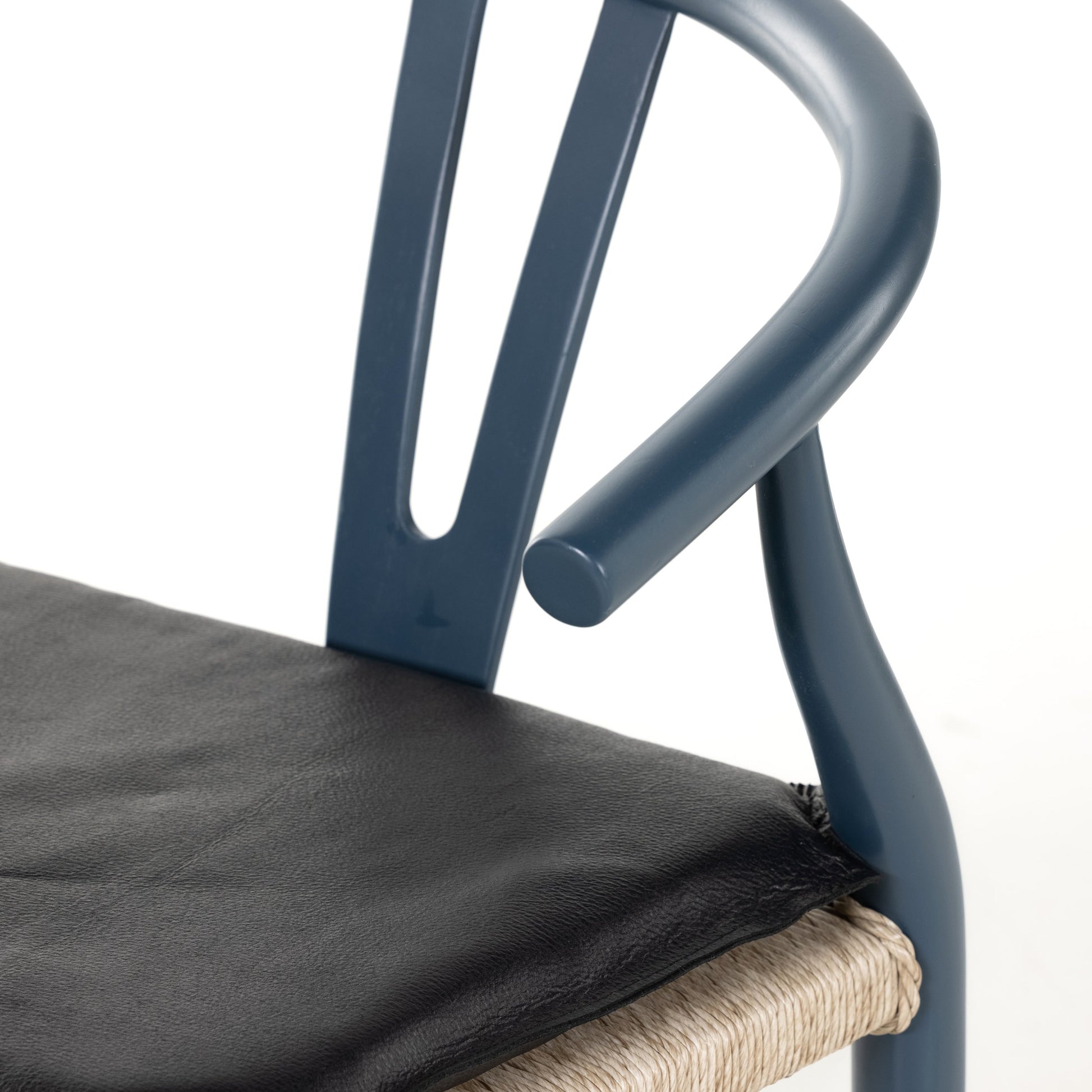 Muestra Dining Chair by Four Hands. Made from solid teak, 100% polyethylene in a coastal style.