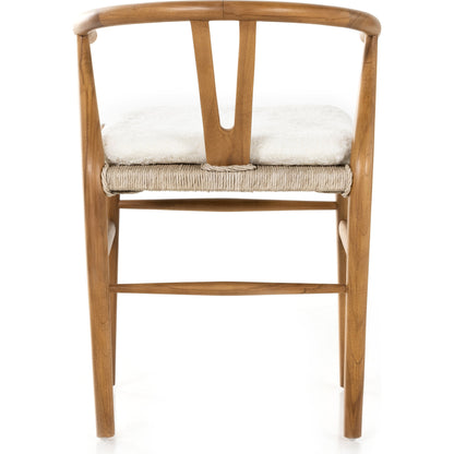 Muestra Dining Chair by Four Hands. Made from solid teak, 100% polyethylene in a coastal style.