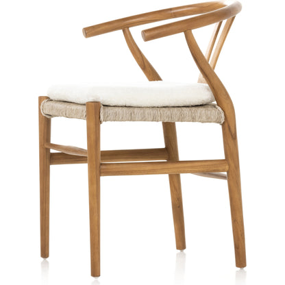 Muestra Dining Chair by Four Hands. Made from solid teak, 100% polyethylene in a coastal style.