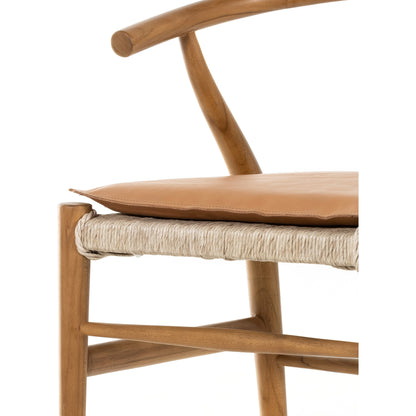 Muestra Dining Chair by Four Hands. Made from solid teak, 100% polyethylene in a coastal style.