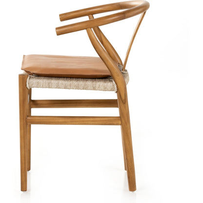 Muestra Dining Chair by Four Hands. Made from solid teak, 100% polyethylene in a coastal style.