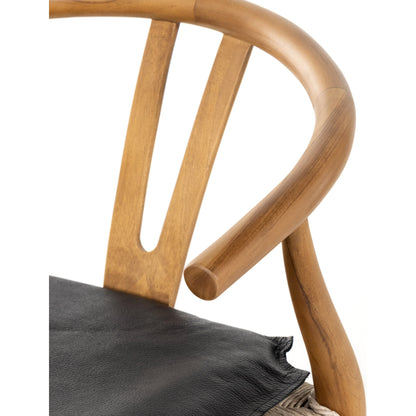 Muestra Dining Chair by Four Hands. Made from solid teak, 100% polyethylene in a coastal style.