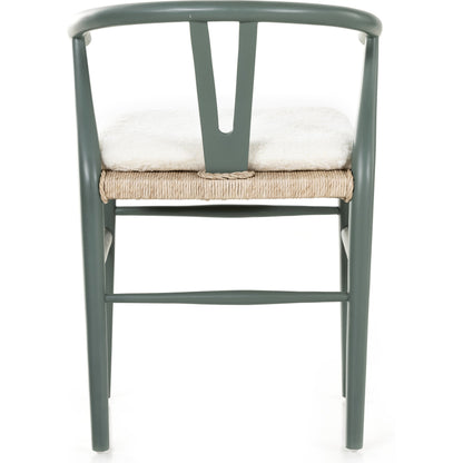 Muestra Dining Chair by Four Hands. Made from solid teak, 100% polyethylene in a coastal style.