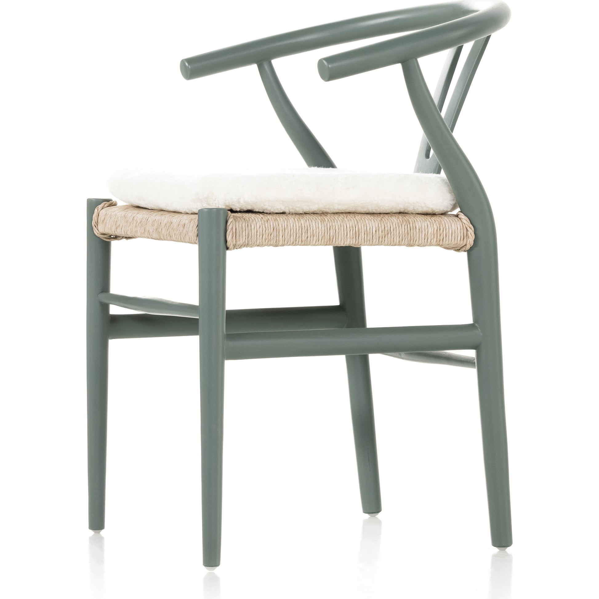 Muestra Dining Chair by Four Hands. Made from solid teak, 100% polyethylene in a coastal style.