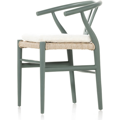 Muestra Dining Chair by Four Hands. Made from solid teak, 100% polyethylene in a coastal style.