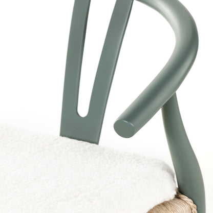 Muestra Dining Chair by Four Hands. Made from solid teak, 100% polyethylene in a coastal style.
