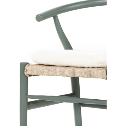 Muestra Dining Chair by Four Hands. Made from solid teak, 100% polyethylene in a coastal style.