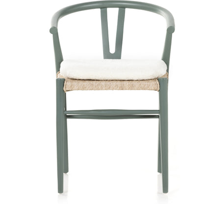 Muestra Dining Chair by Four Hands. Made from solid teak, 100% polyethylene in a coastal style.