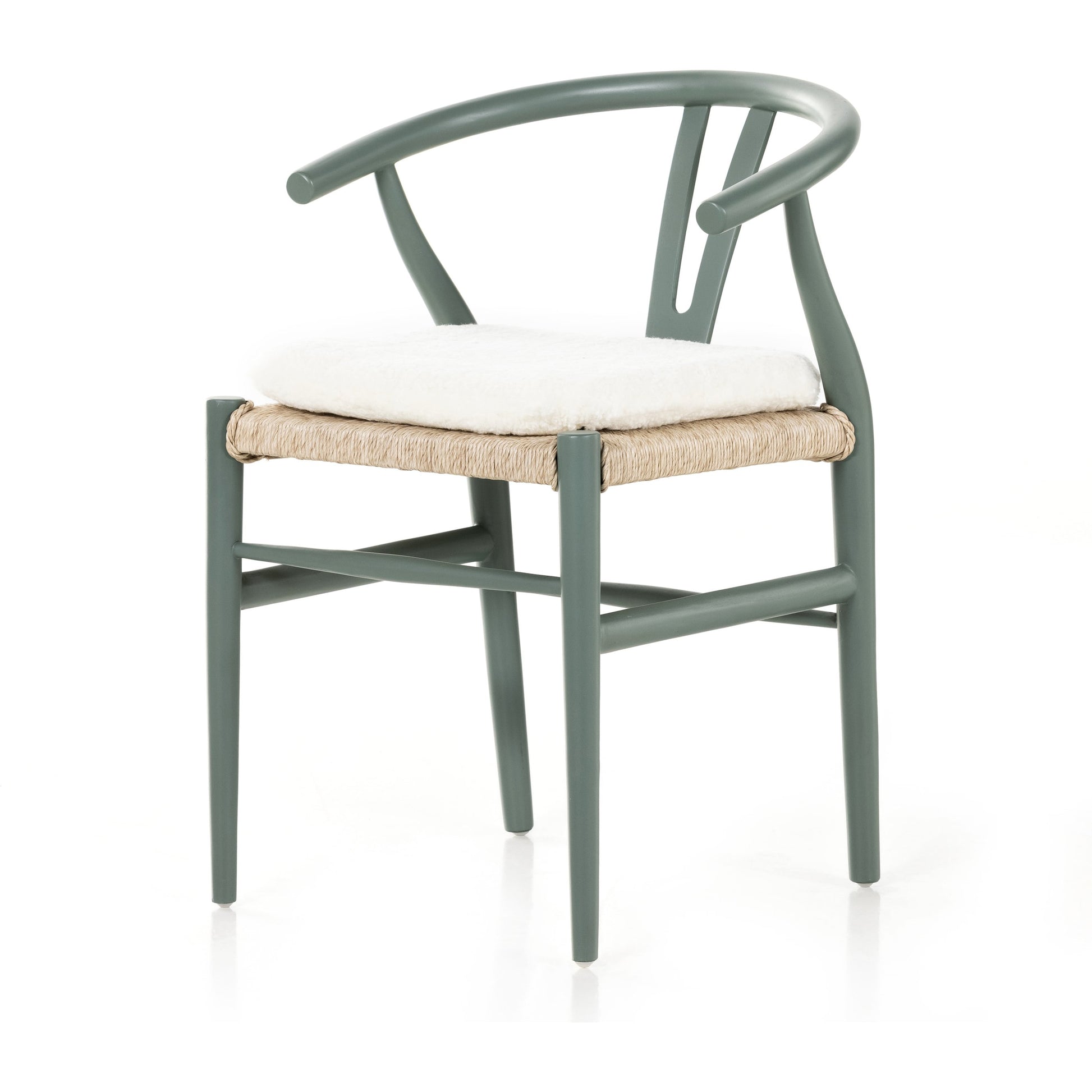 Muestra Dining Chair by Four Hands. Made from solid teak, 100% polyethylene in a coastal style.