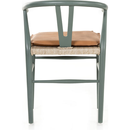 Muestra Dining Chair by Four Hands. Made from solid teak, 100% polyethylene in a coastal style.