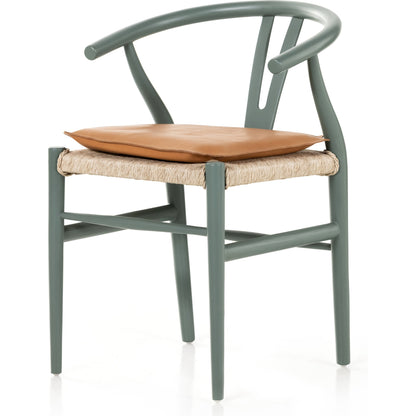 Muestra Dining Chair by Four Hands. Made from solid teak, 100% polyethylene in a coastal style.