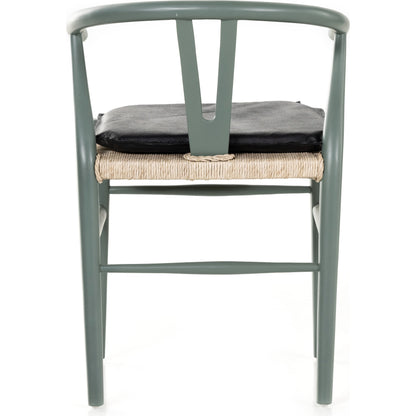 Muestra Dining Chair by Four Hands. Made from solid teak, 100% polyethylene in a coastal style.