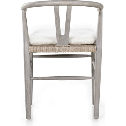 Muestra Dining Chair by Four Hands. Made from solid teak, 100% polyethylene in a coastal style.