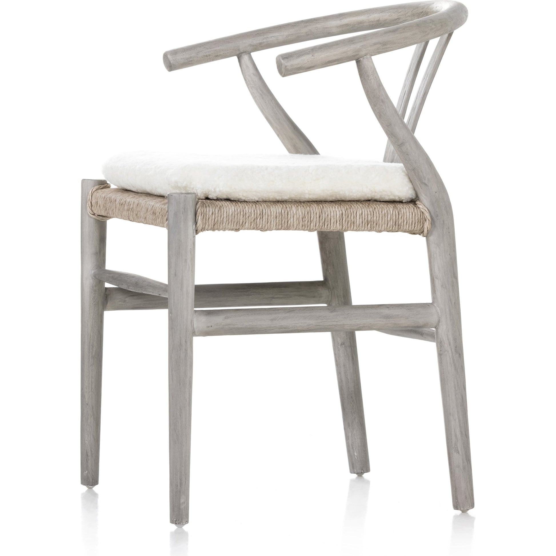 Muestra Dining Chair by Four Hands. Made from solid teak, 100% polyethylene in a coastal style.