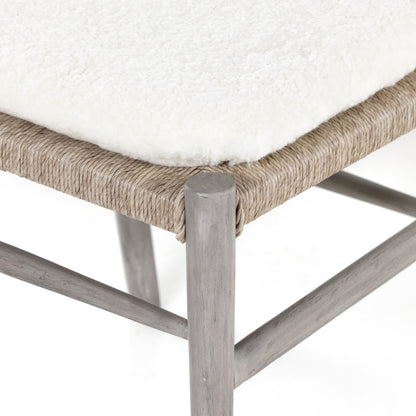 Muestra Dining Chair by Four Hands. Made from solid teak, 100% polyethylene in a coastal style.