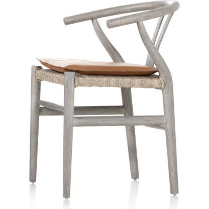 Muestra Dining Chair by Four Hands. Made from solid teak, 100% polyethylene in a coastal style.