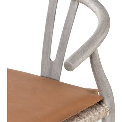 Muestra Dining Chair by Four Hands. Made from solid teak, 100% polyethylene in a coastal style.