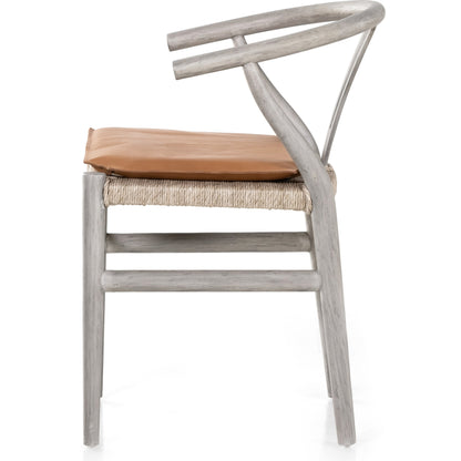 Muestra Dining Chair by Four Hands. Made from solid teak, 100% polyethylene in a coastal style.